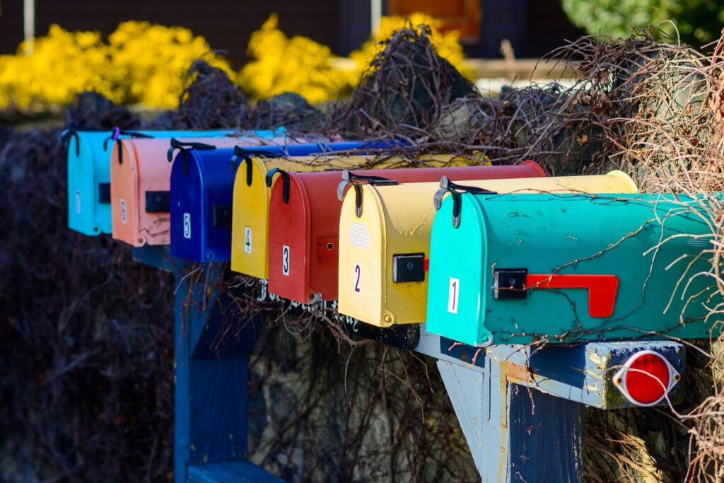 Row of colorful mailboxes.